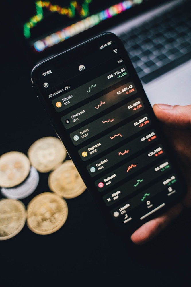 A close-up phone interface showing a detailed cryptocurrency portfolio